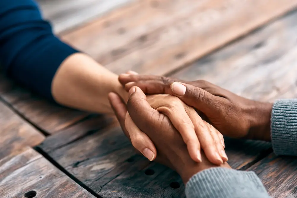 I-find-comfort-in-being-with-you - Finding Peace Counseling Service PLLC Cropped shot of two unrecognizable people holding hands